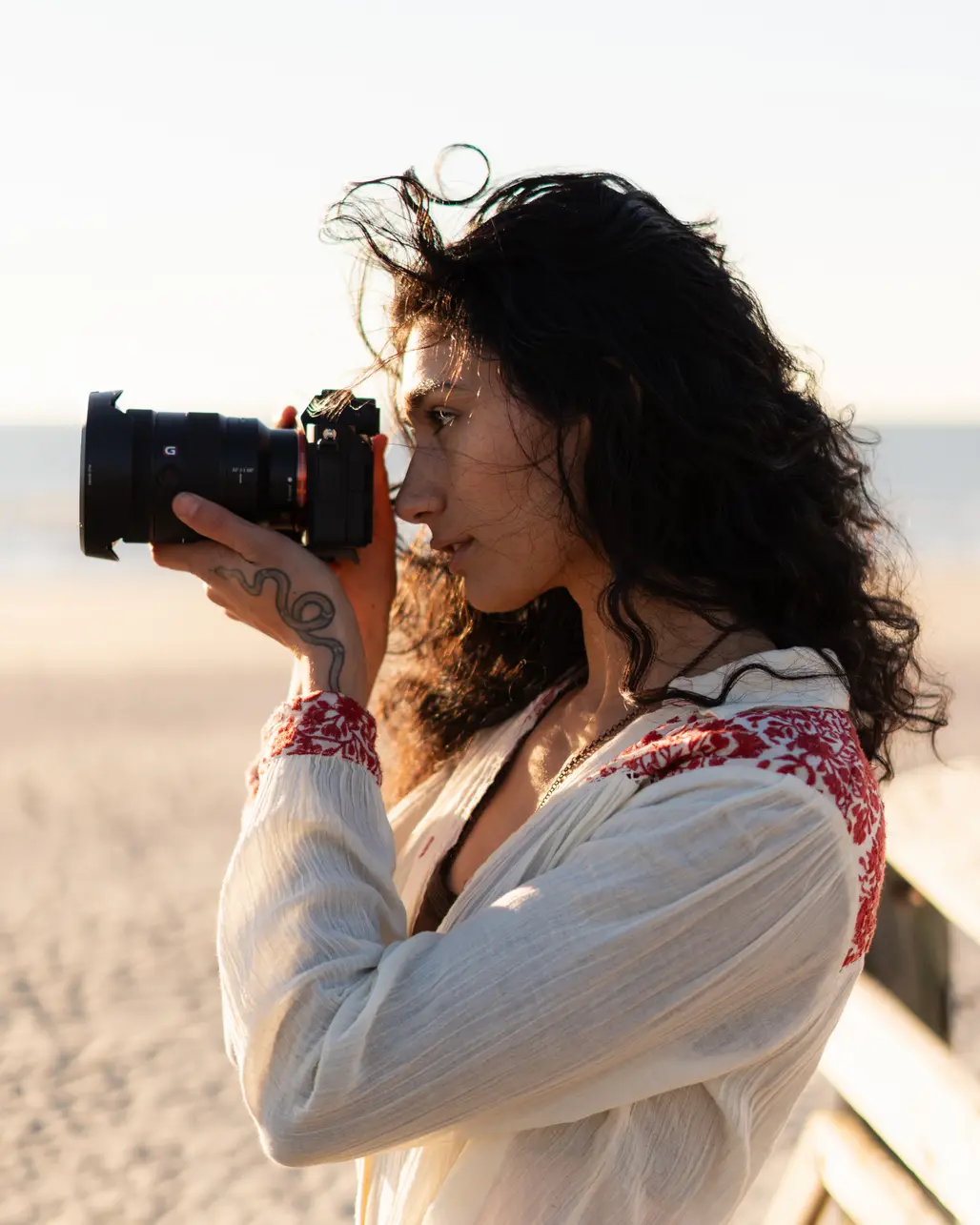 Abby Fisher photographing on the Charleston coast at golden hour